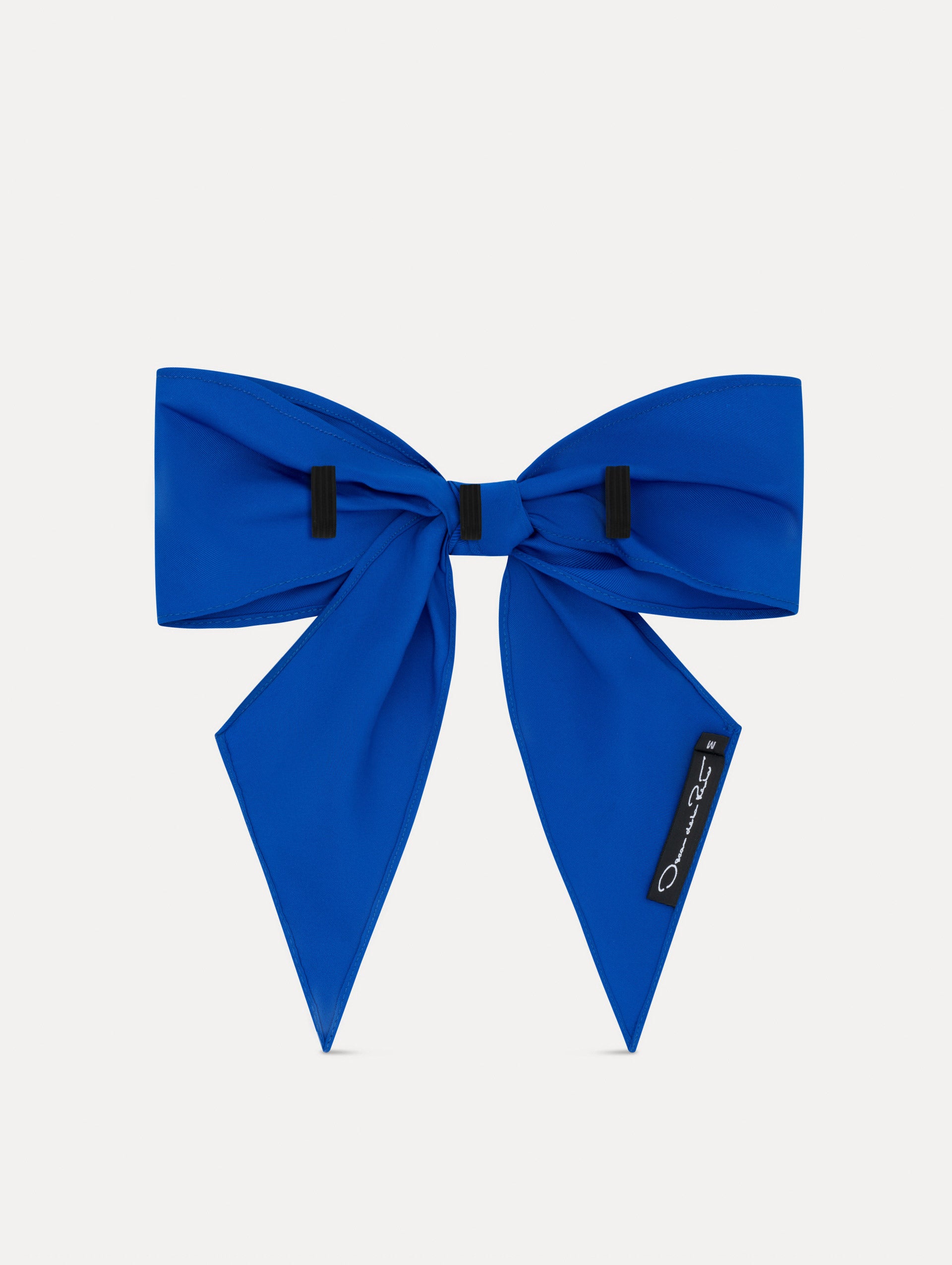 Lapis Blue ODLR x @SimonSits Dog Bow featuring an oversized shape and long pointed tails. Back View.