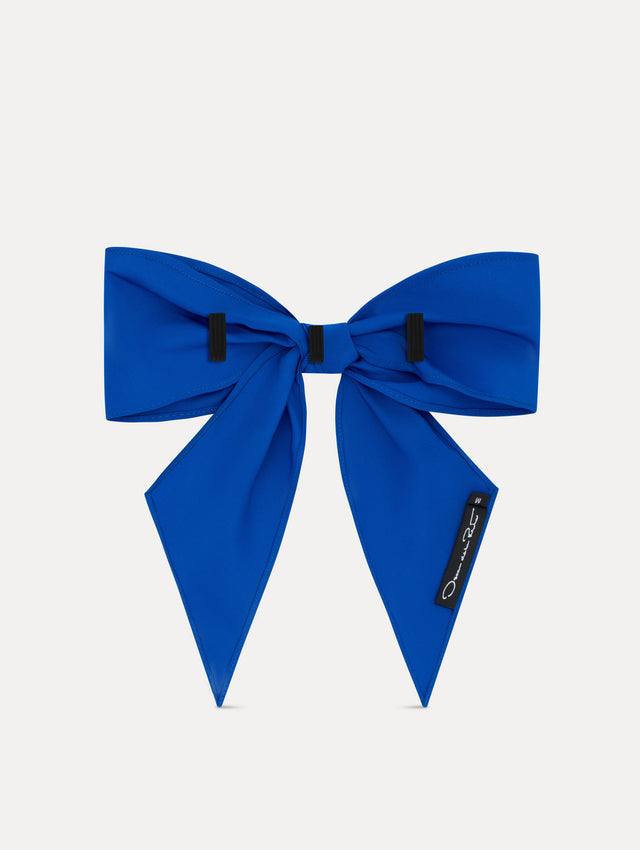 Lapis Blue ODLR x @SimonSits Dog Bow featuring an oversized shape and long pointed tails. Back View.
