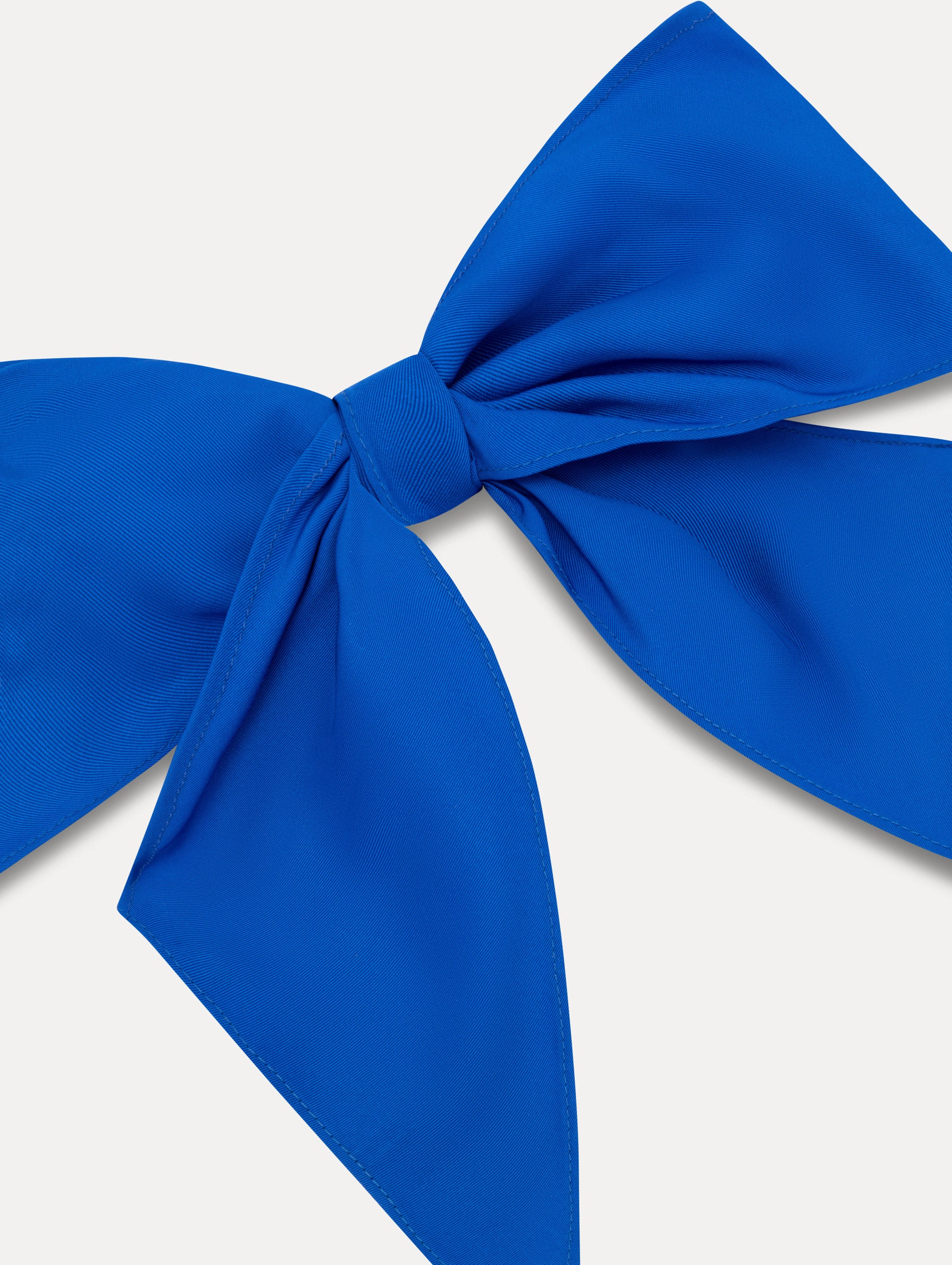 Lapis Blue ODLR x @SimonSits Dog Bow featuring an oversized shape and long pointed tails. Zoom View.