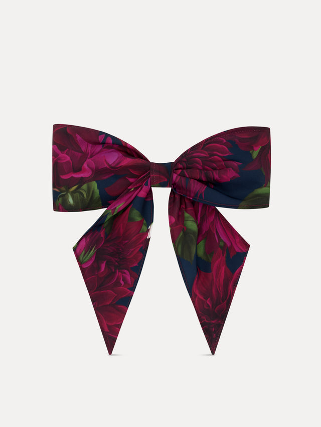 Purple and navy floral ODLR x @SimonSits Dahlia Dog Bow featuring an oversized shape and long pointed tails. Front View.