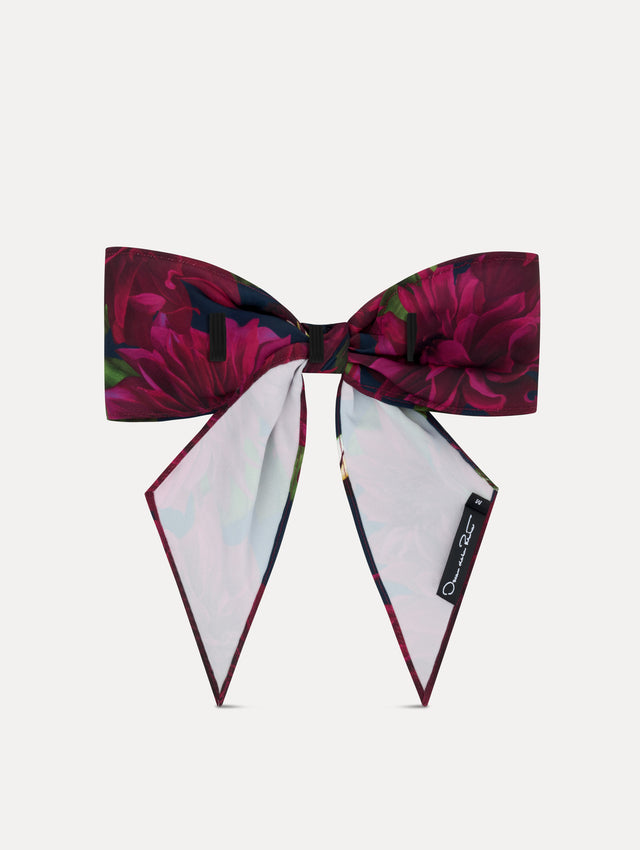 Purple and navy floral ODLR x @SimonSits Dahlia Dog Bow featuring an oversized shape and long pointed tails. Back View.