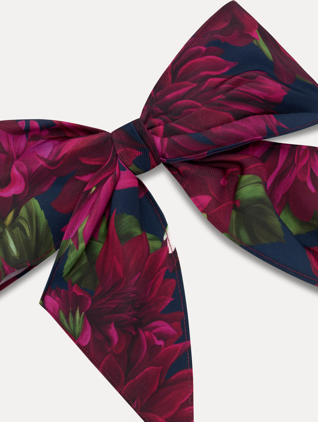 Purple and navy floral ODLR x @SimonSits Dahlia Dog Bow featuring an oversized shape and long pointed tails. Zoom View.