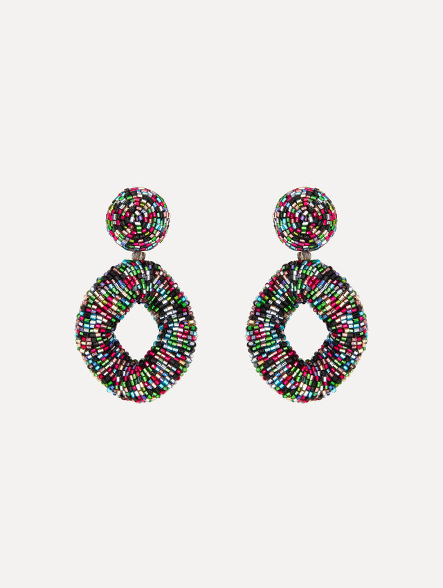 Hand-beaded earrings feature jet-black bugle beads in a bold, open-loop silhouette. 