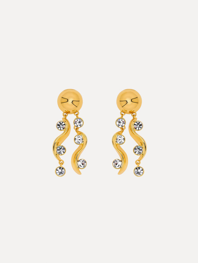 Drop earrings feature two polished gold-tone waves, each accented with brilliant round crystals, cascading from a sleek gold ball stud. 