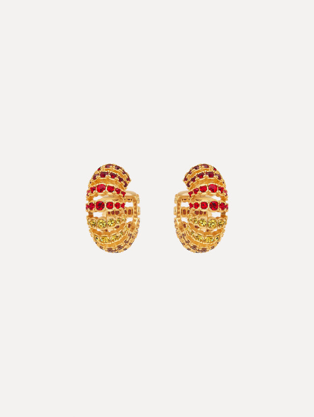 Hoop earrings feature arched rows of faceted crystals in a polished gold-tone setting. 