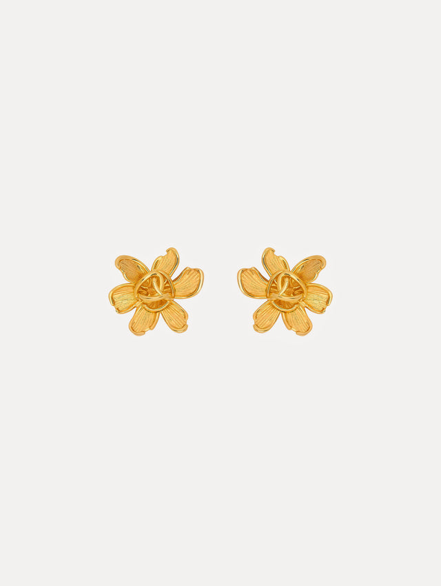 Gold floral post back earrings with braided oscar o in the center of the flower.