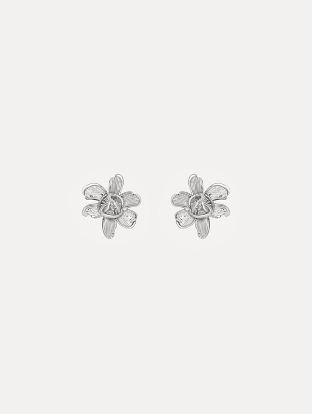Silver floral post back earring with braided oscar o in the center of the flower.