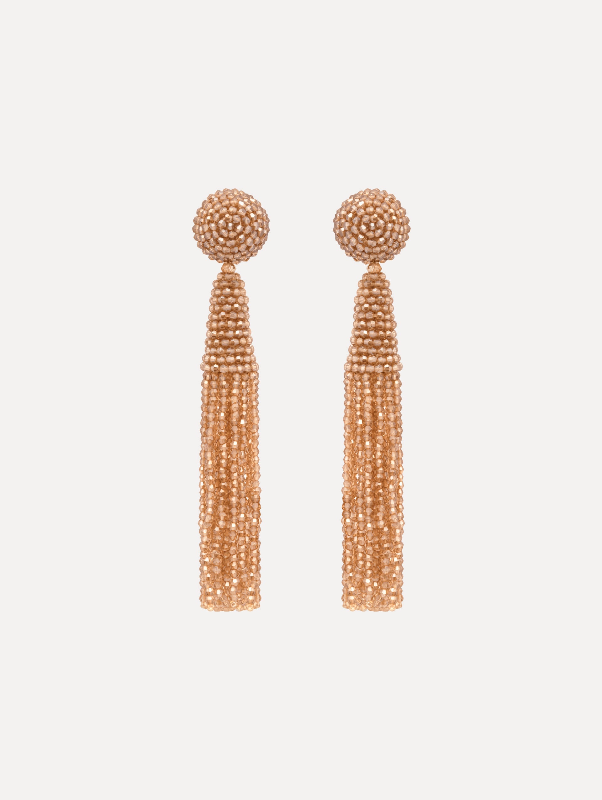 The Conical Tassel Clip-On Earrings in Champagne.
