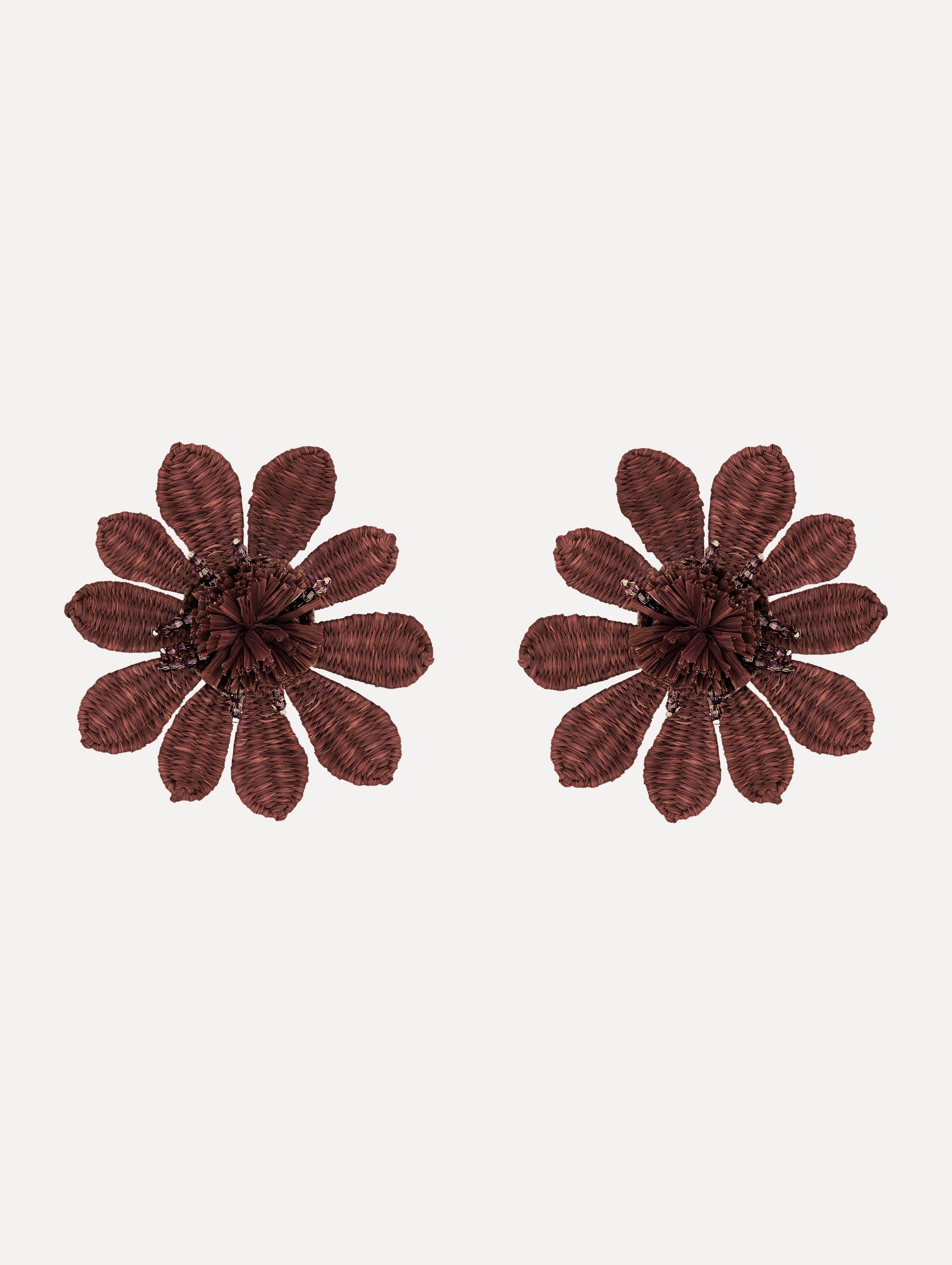 The Woven Raffia Flower Clip-On Earrings in Mauve.