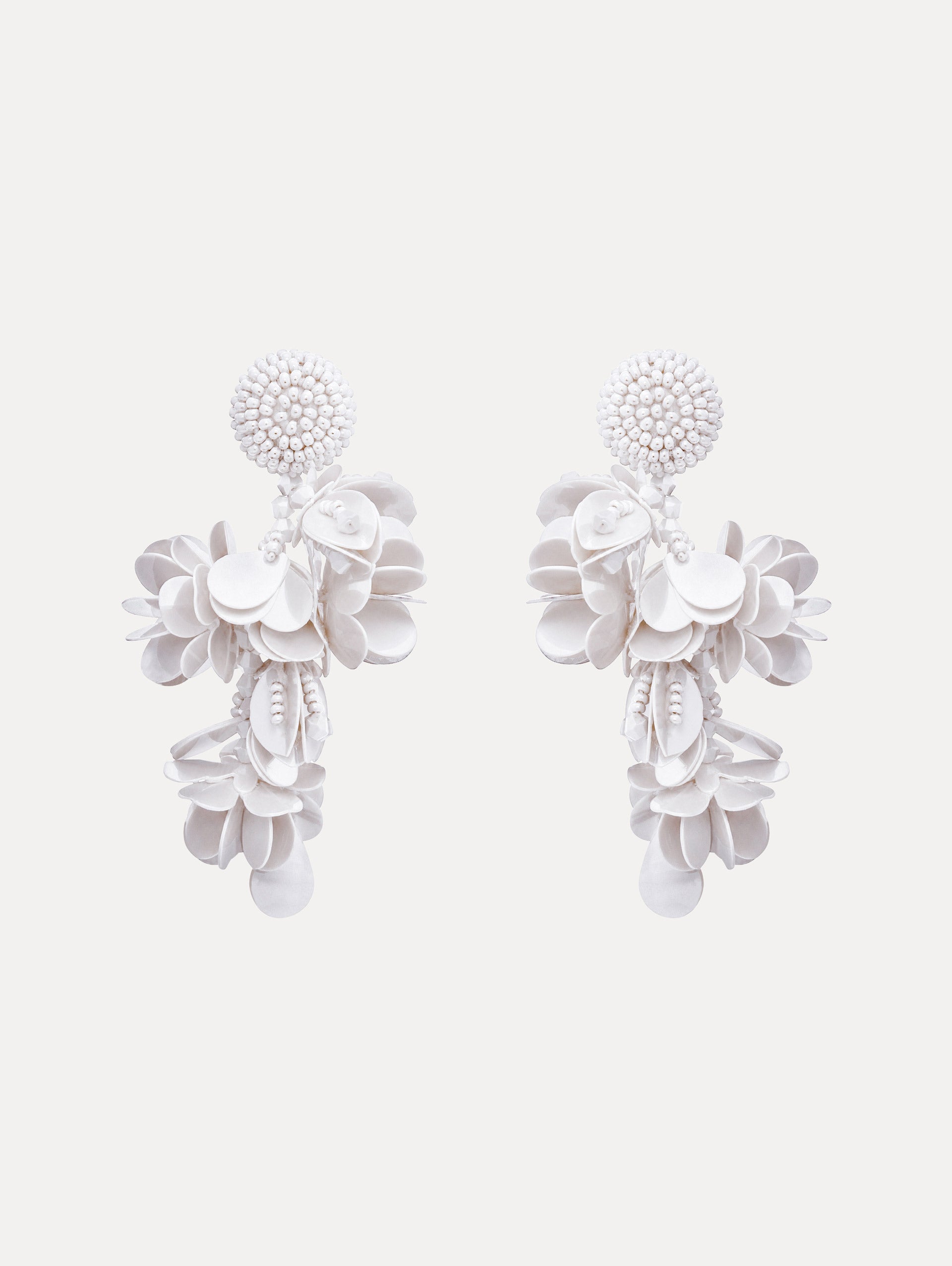 The Beaded Floral Bouquet Clip-On Earrings in White.