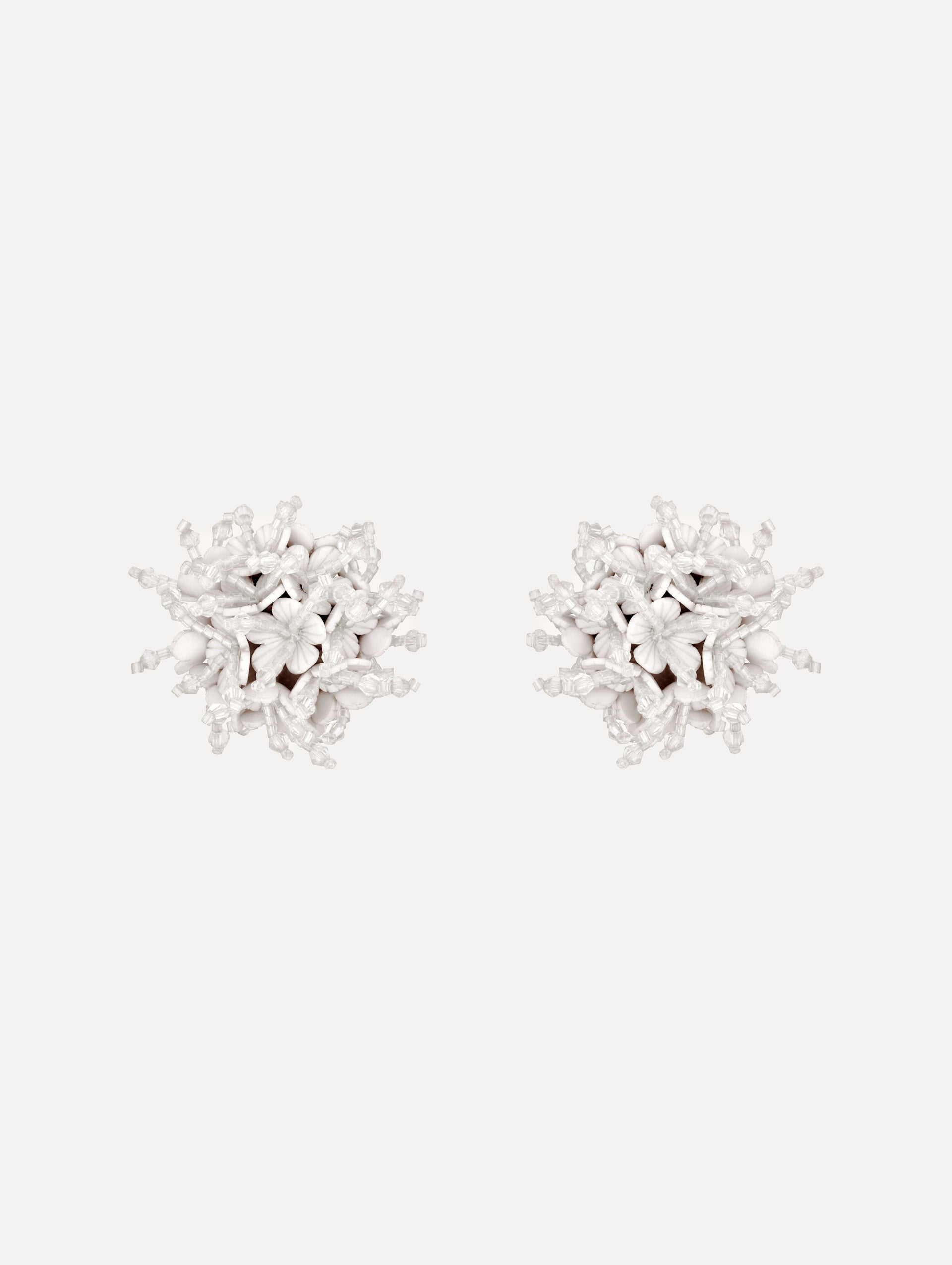 The Firework Clip-On Earrings in White.