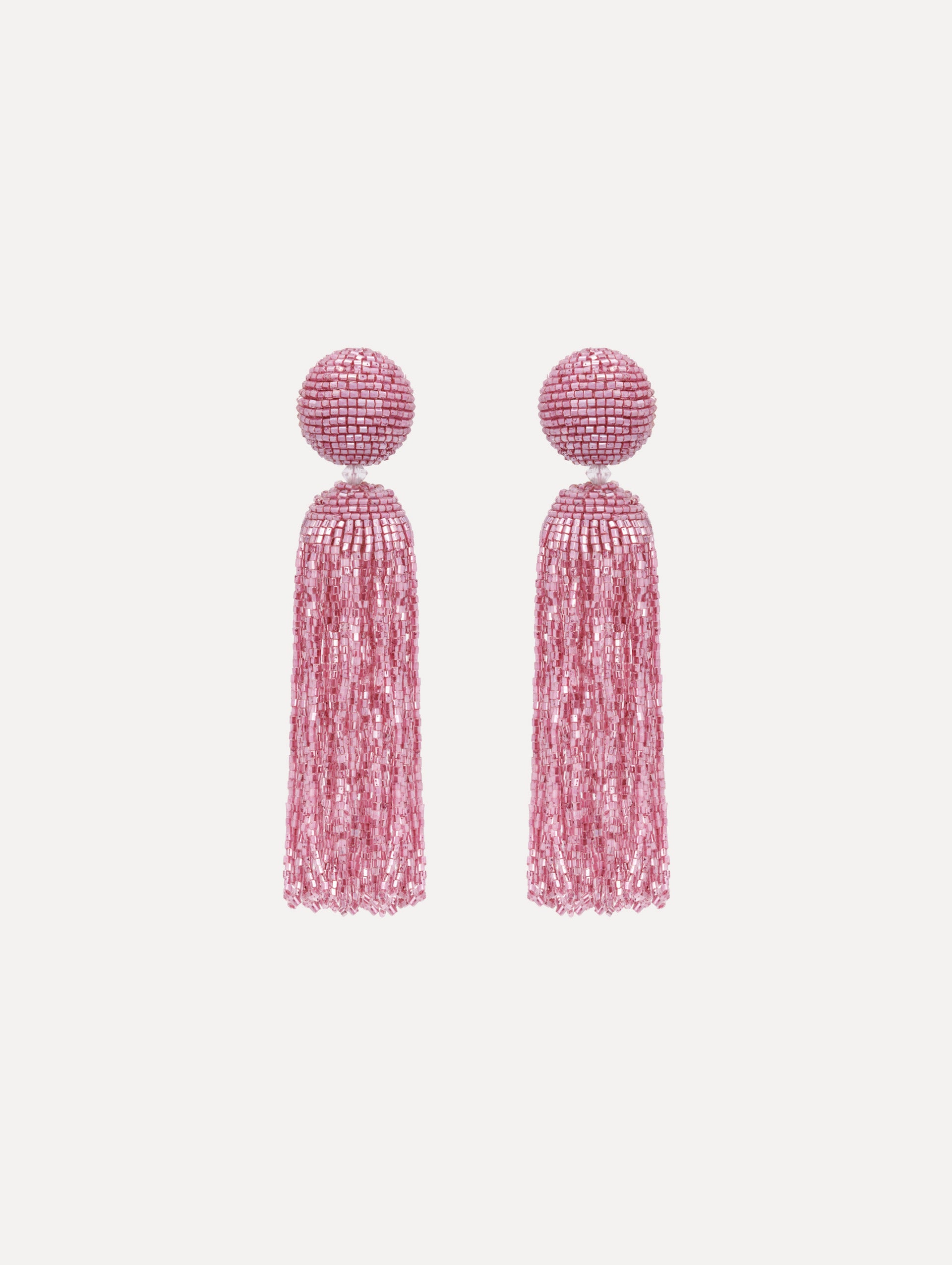The Metallic Beaded Tassel Clip-On Earrings in Pink.