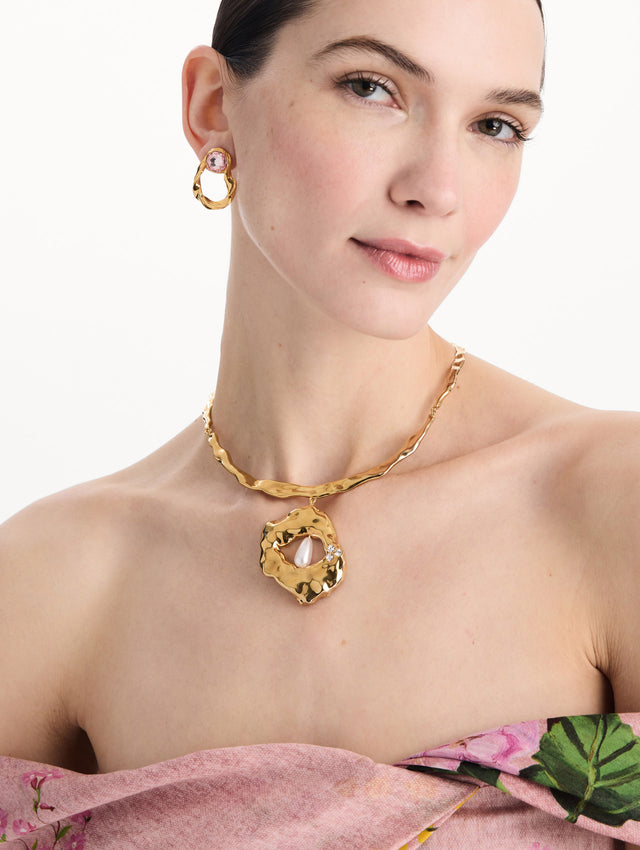 The Hammered Pearl Pendant Necklace in Pearl. Front view.