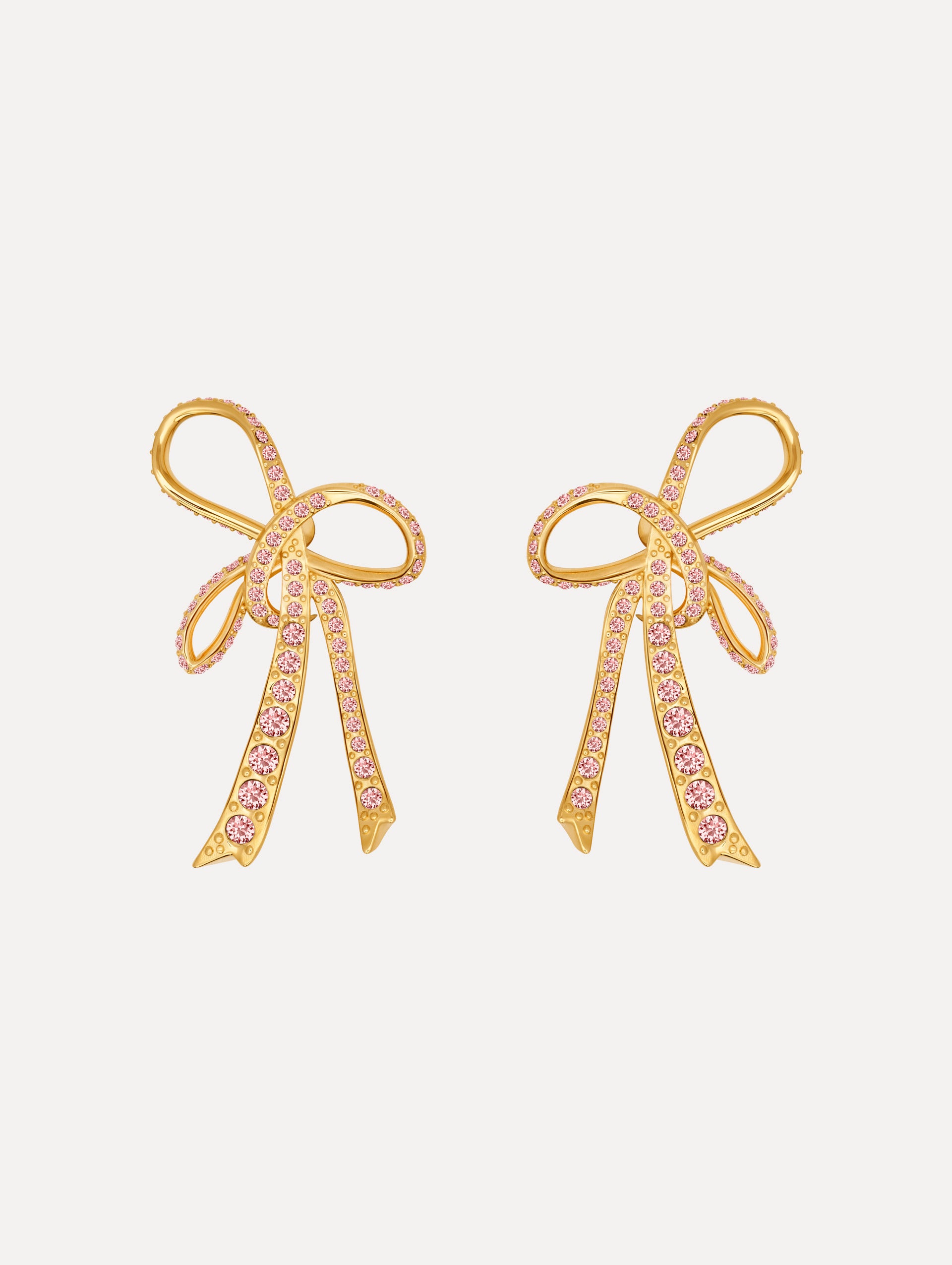 The Crystal Pavé Threaded Bow Clip-On Earrings in Rose.
