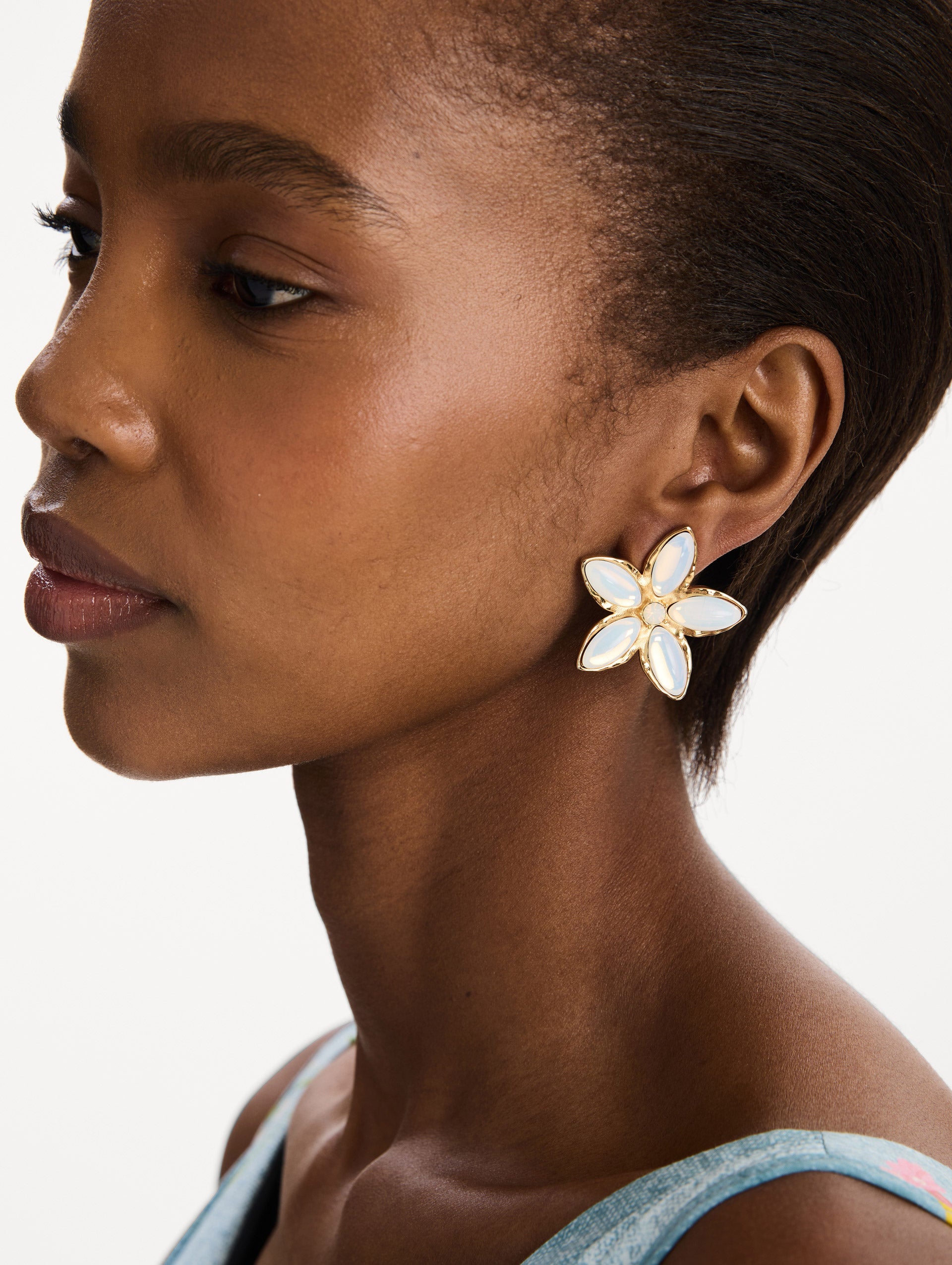 The Floral Cabochon Earrings in Pearl. Front view. 