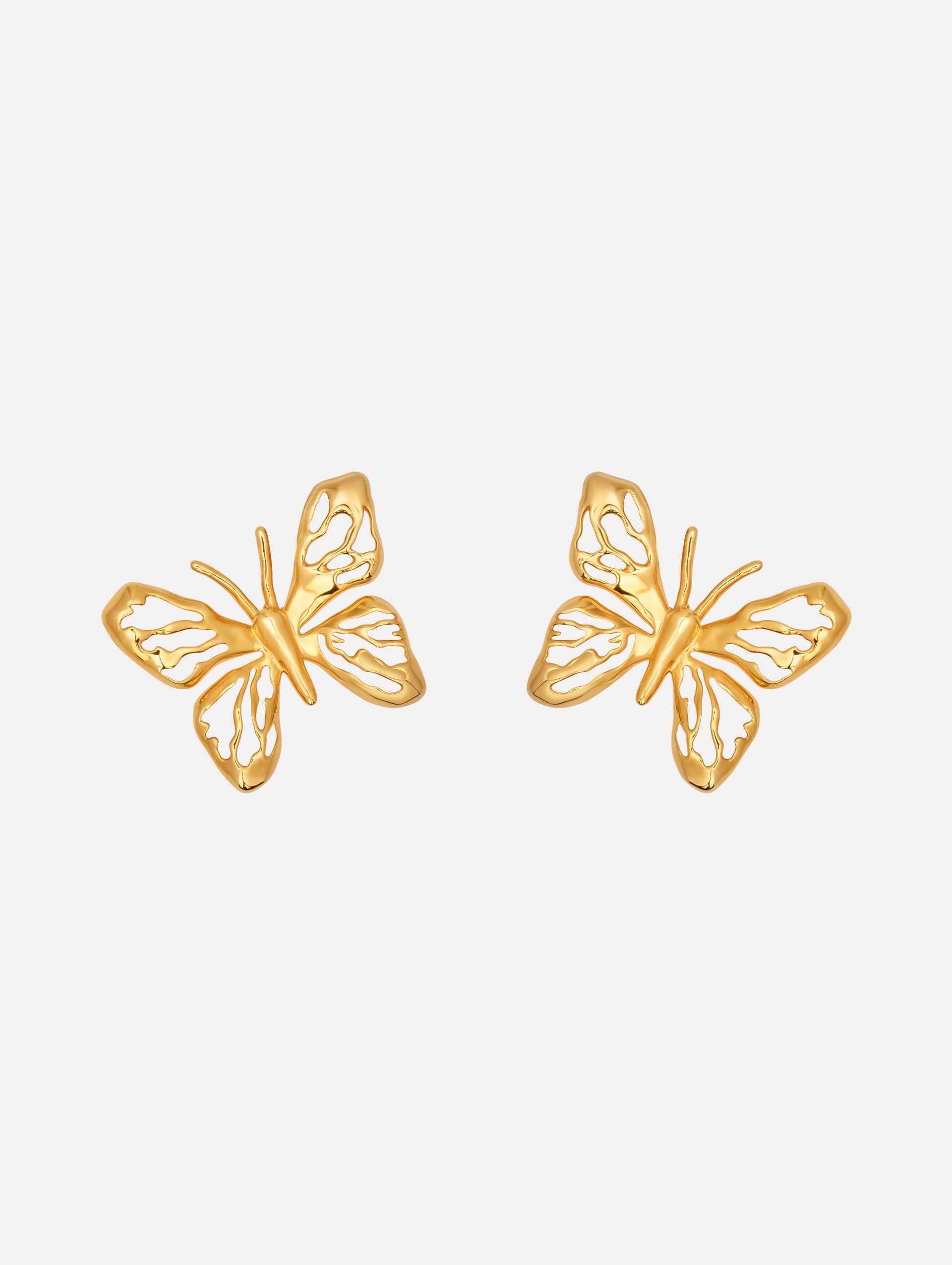 The Openwork Butterfly Clip-On Earrings in Gold.