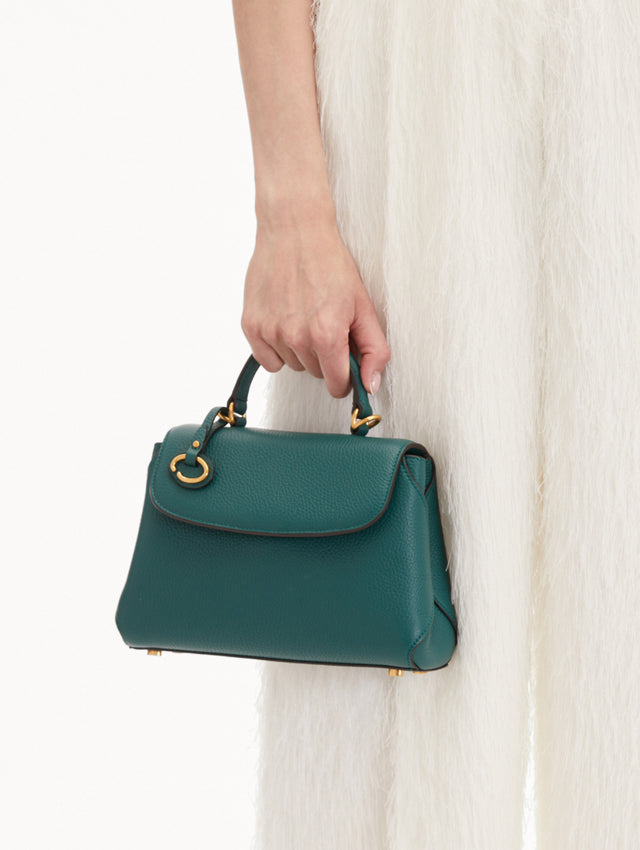 The Mini Poppy Leather Handbag in Green with O logo Tag around the Top Handle, and Detachable Shoulder Strap. Front View