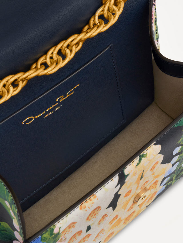 Floral Foxglove Printed TRO Bag with gold Hardware and Flower detail. Zoom View.