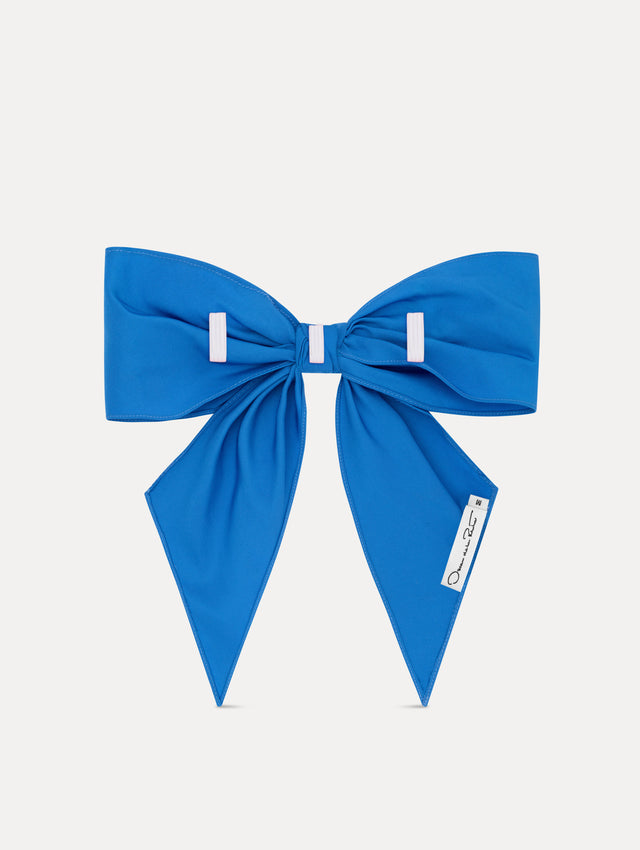 Blue ODLR x @SimonSits Dog Bow featuring an oversized shape and long pointed tails. Back View.