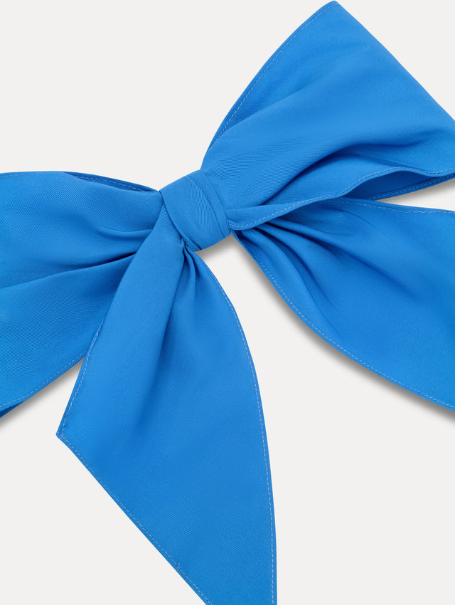 Blue ODLR x @SimonSits Dog Bow featuring an oversized shape and long pointed tails. Zoom View.