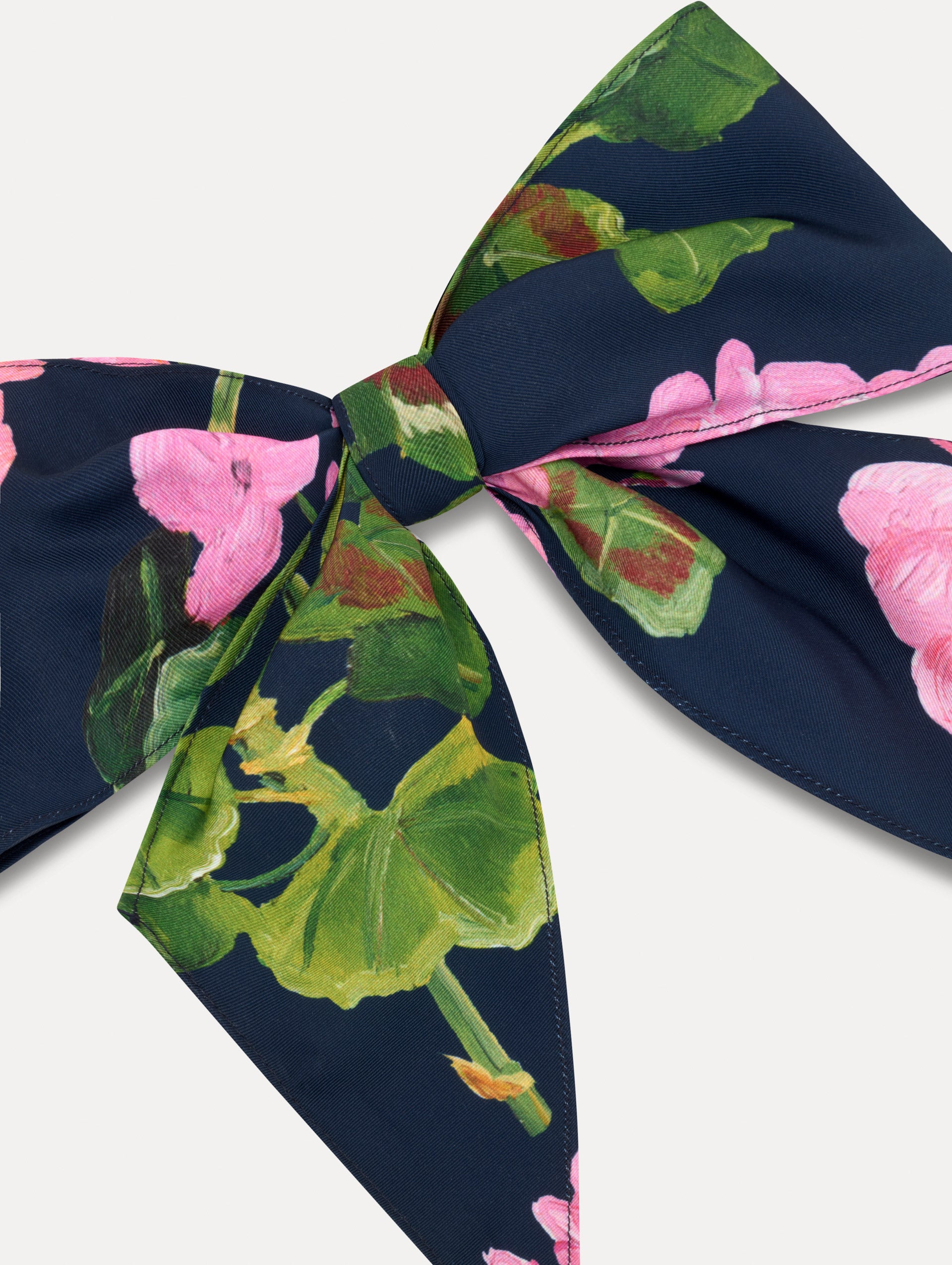 Navy and Pink floral ODLR x @SimonSits Geranium Dog Bow featuring an oversized shape and long pointed tails. Zoom View.