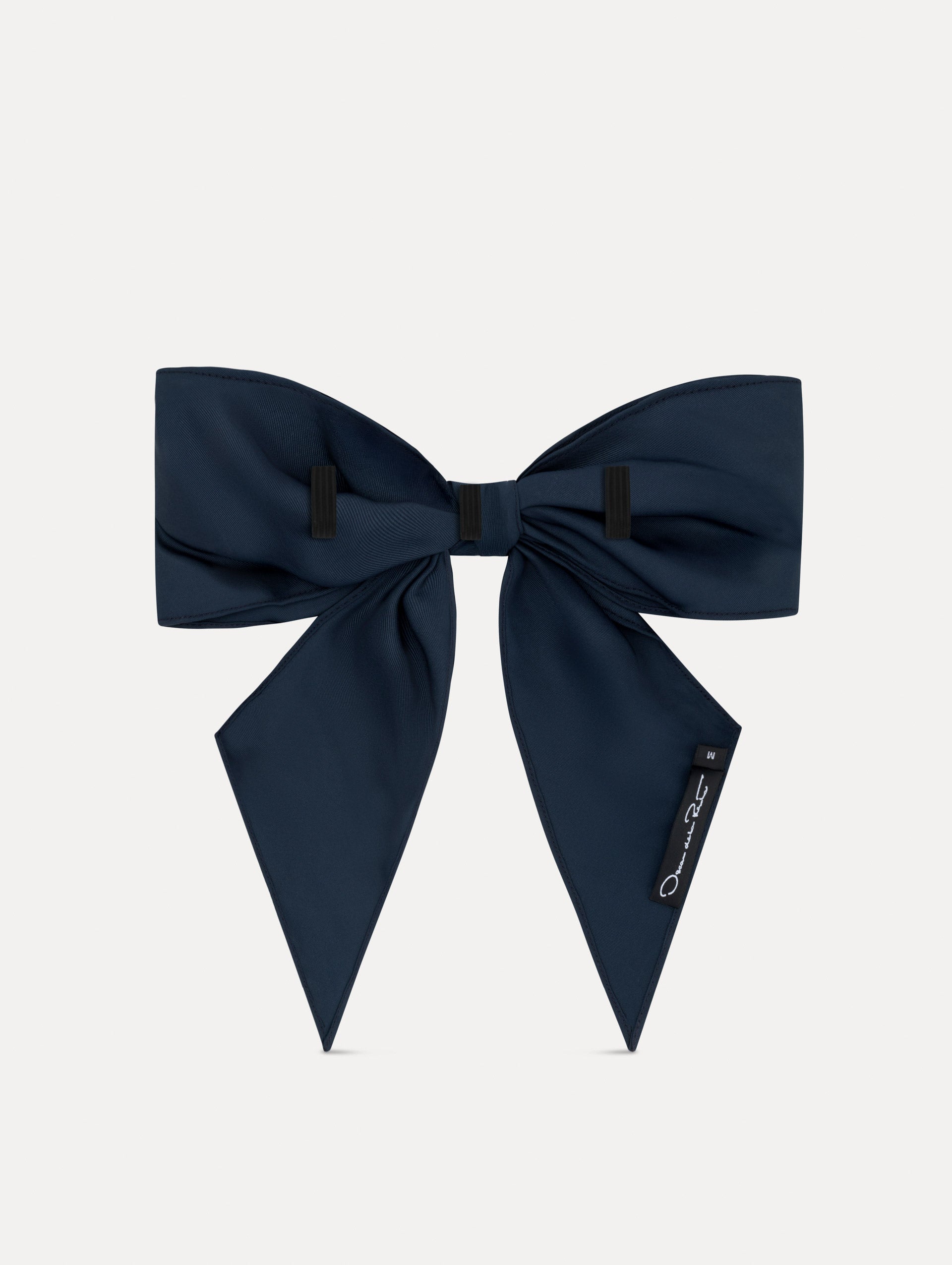 Navy ODLR x @SimonSits Dog Bow featuring an oversized shape and long pointed tails. Back View.