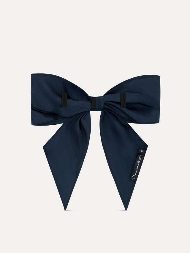 Navy ODLR x @SimonSits Dog Bow featuring an oversized shape and long pointed tails. Back View.