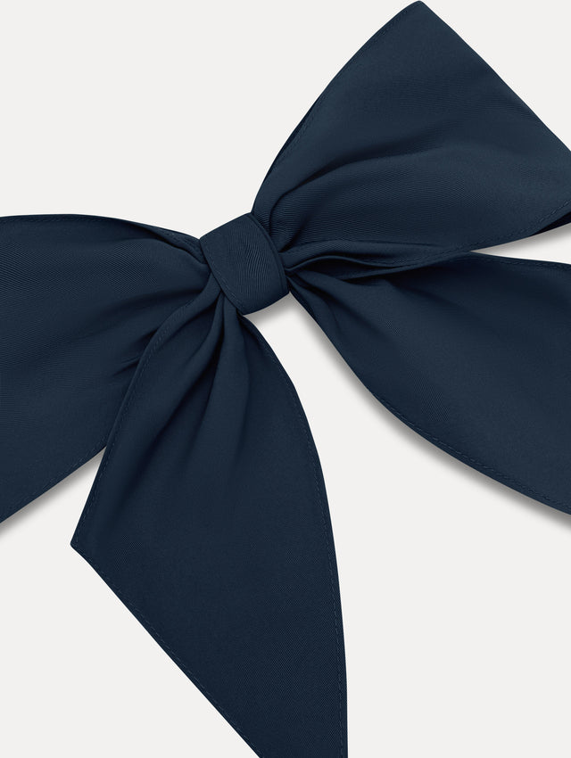 Navy ODLR x @SimonSits Dog Bow featuring an oversized shape and long pointed tails. Zoom View.