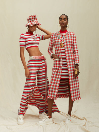 Two models wear matching red white and grey sets