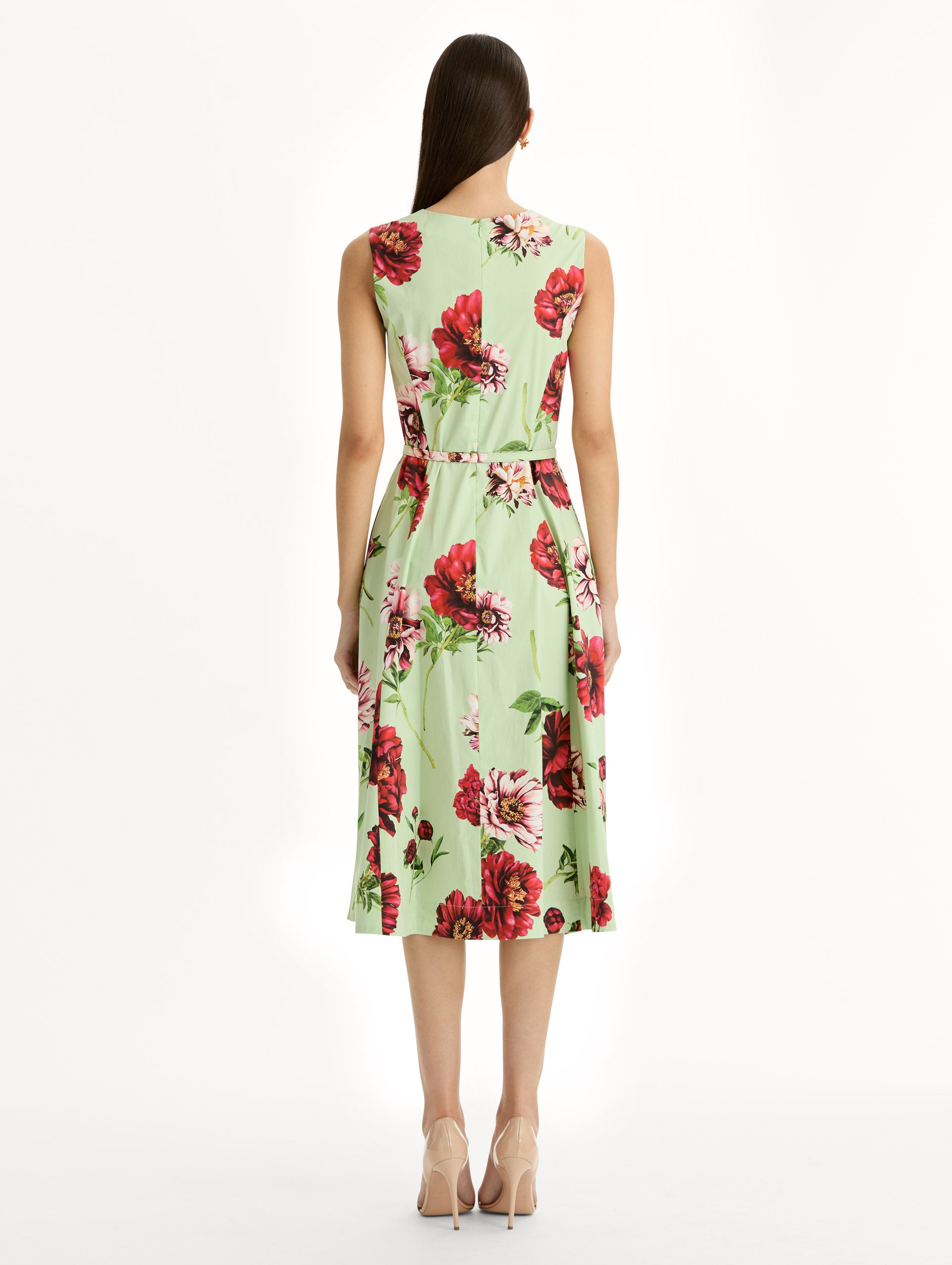 light green Peony Cotton Poplin Sleeveless Dress with belted waist and red floral print. Back View.