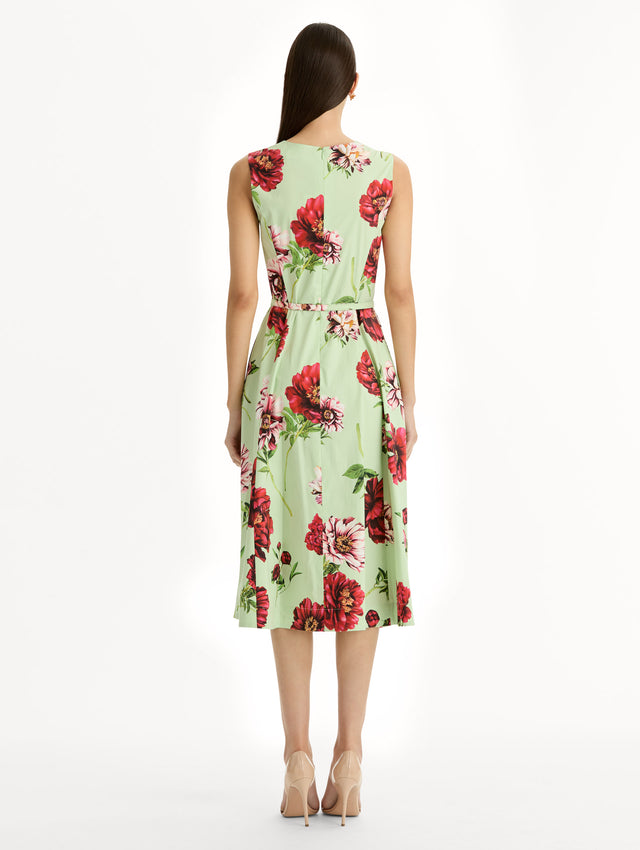 light green Peony Cotton Poplin Sleeveless Dress with belted waist and red floral print. Back View.