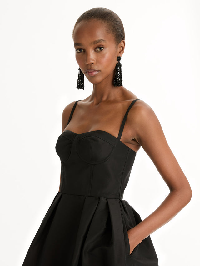 Black Bustier-Detailed Faille Dress with thin straps, a bustier bodice, and midi length skirt. Zoom View.