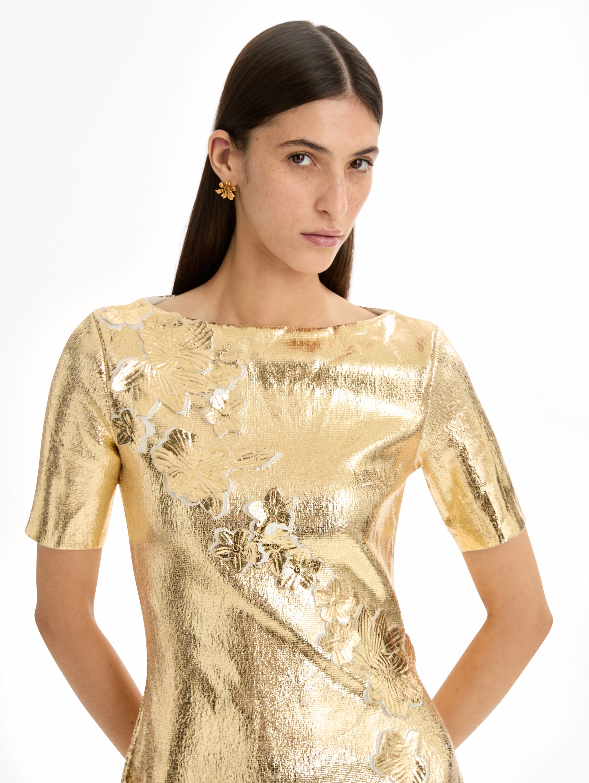 Metallic gold sleeveless mini dress with cherry blossom lace embroidery. Zoom view.