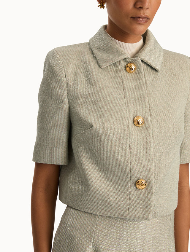 Front view of grey tweed short sleeve jacket. Zoom view.