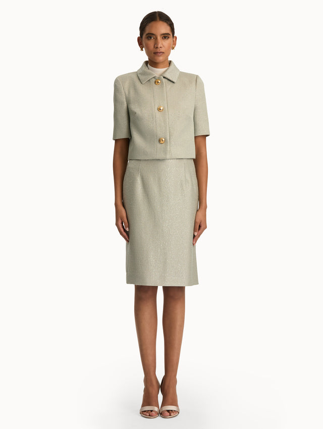 Front view of grey tweed short sleeve jacket. Front view.