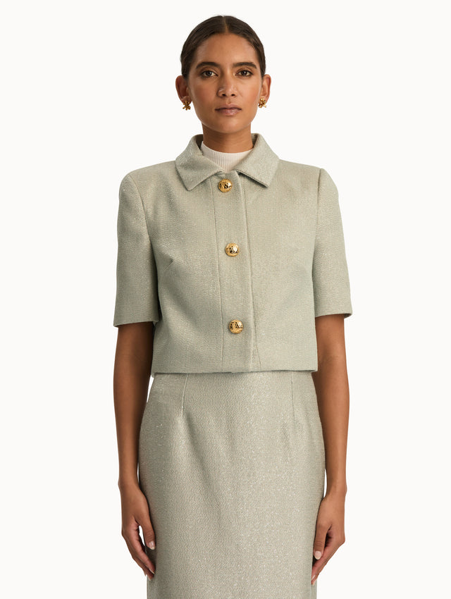 Front view of grey tweed short sleeve jacket. Front view.