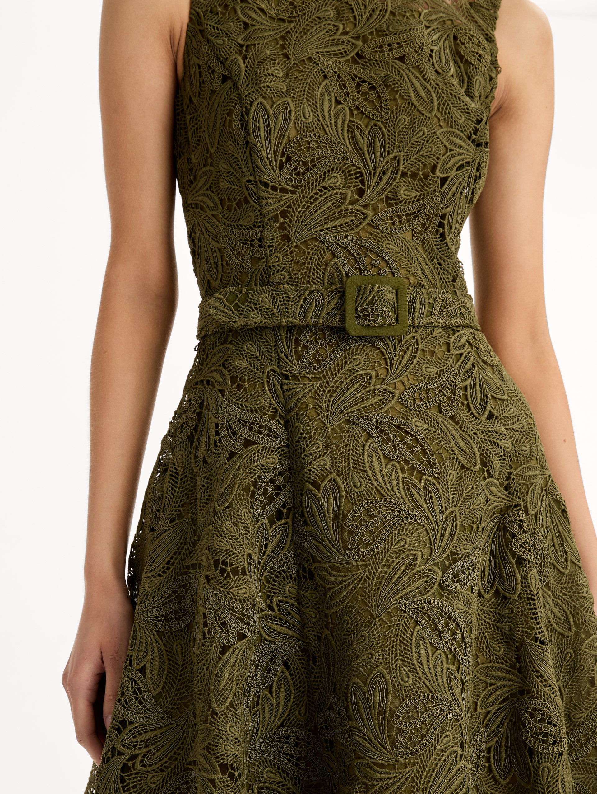 Moss Feather Scroll Guipure Dress with belted waist and sleeveless bodice. Zoom View.