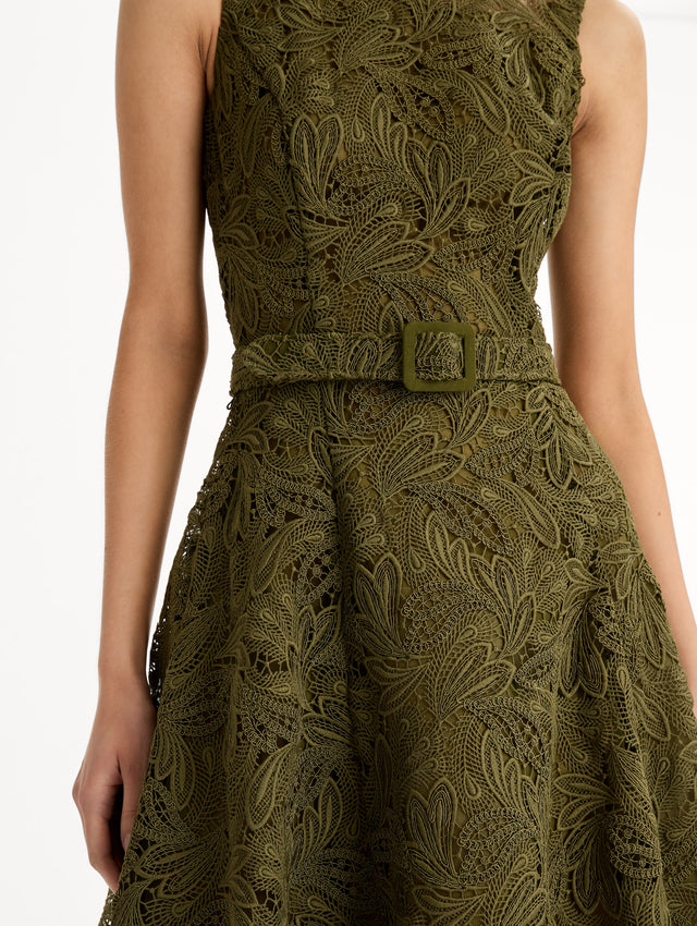 Moss Feather Scroll Guipure Dress with belted waist and sleeveless bodice. Zoom View.