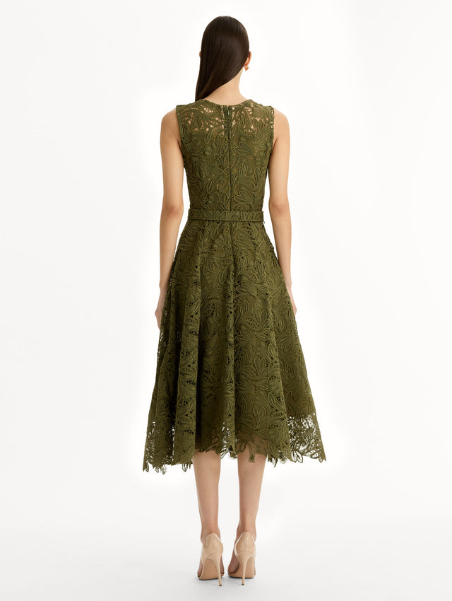 Moss Feather Scroll Guipure Dress with belted waist and sleeveless bodice. Back View.