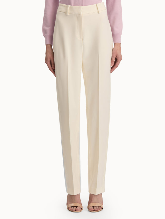 Front view of straight leg ivory pants. Front view.