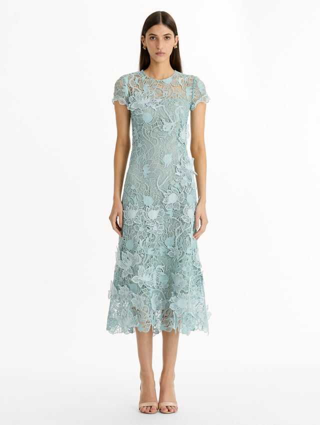 Blue Corded Botanical Guipure Dress with short sleeves and a sheer botanical overlay. Front View.