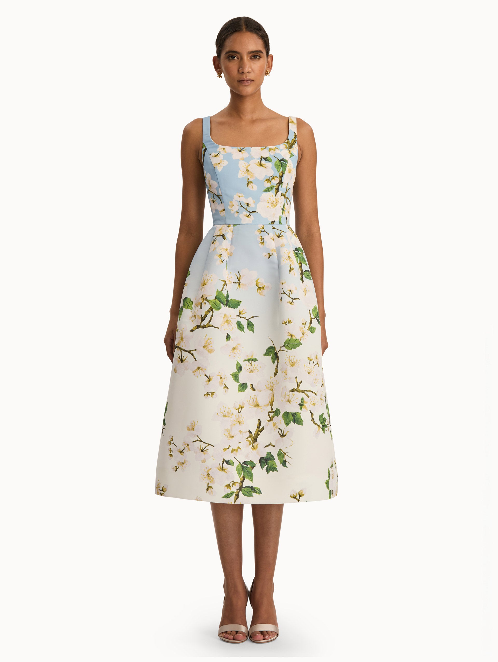 Front view of cherry blossom dress with a blue to white ombre. Front View.