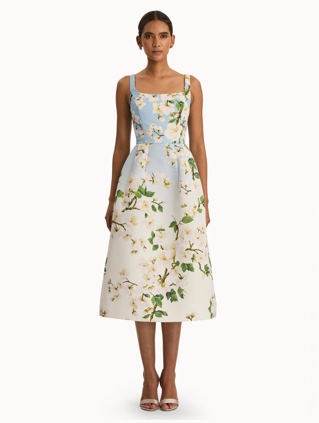 Front view of cherry blossom dress with a blue to white ombre. Front View.