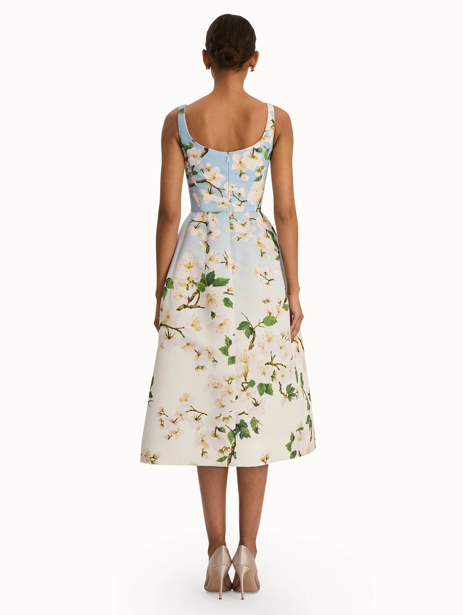 Front view of cherry blossom dress with a blue to white ombre. Back view.