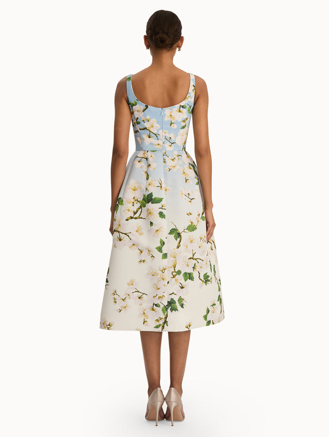 Front view of cherry blossom dress with a blue to white ombre. Back view.