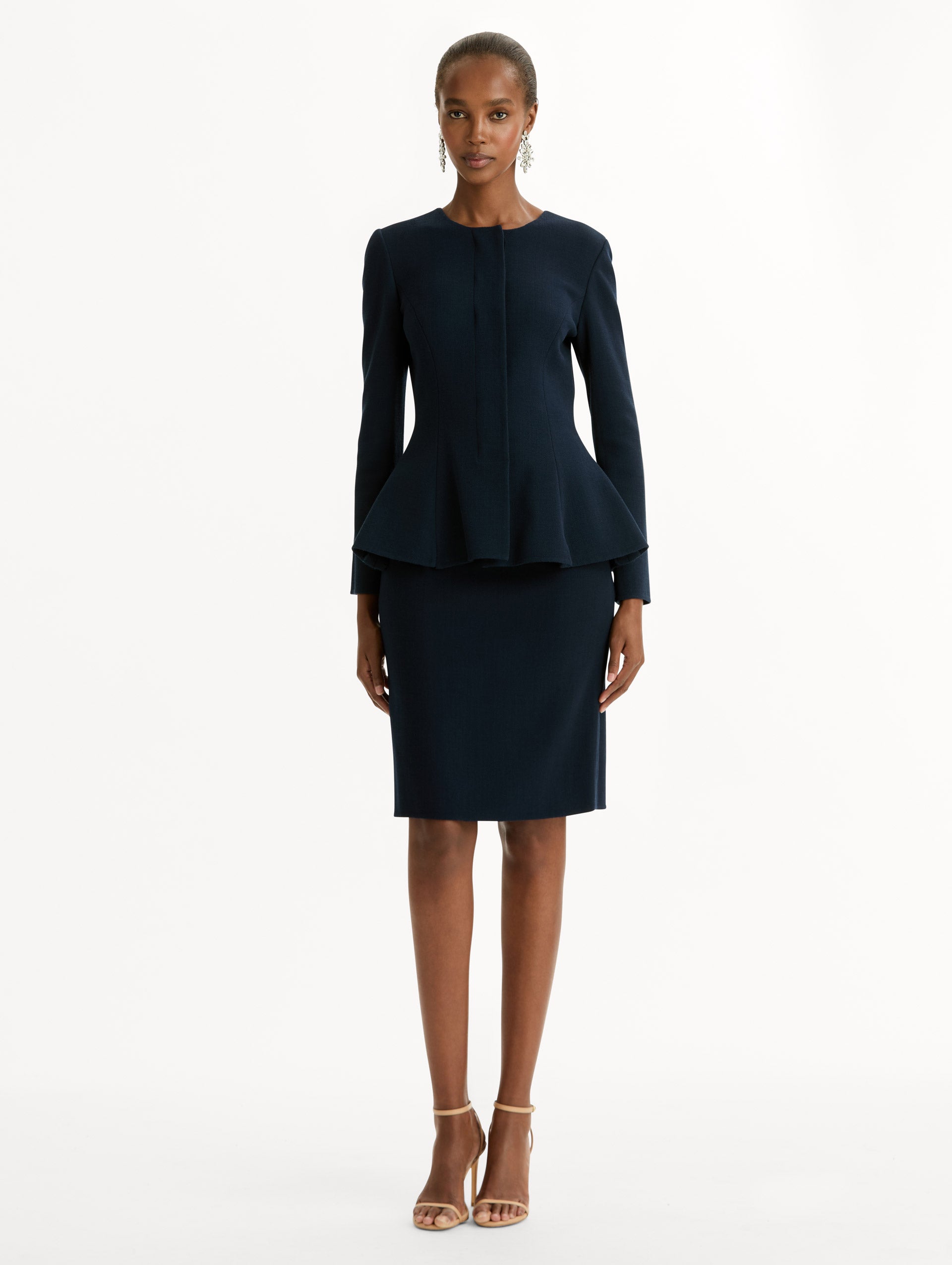 Peplum Wool-Blend Jacket in Navy. Front View.