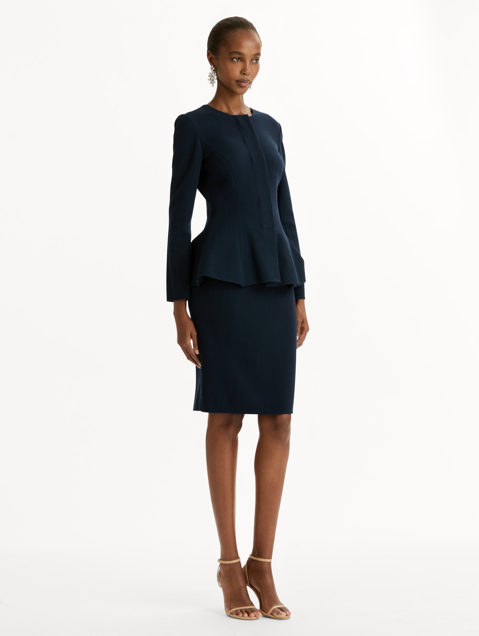 Peplum Wool-Blend Jacket in Navy. Side View.