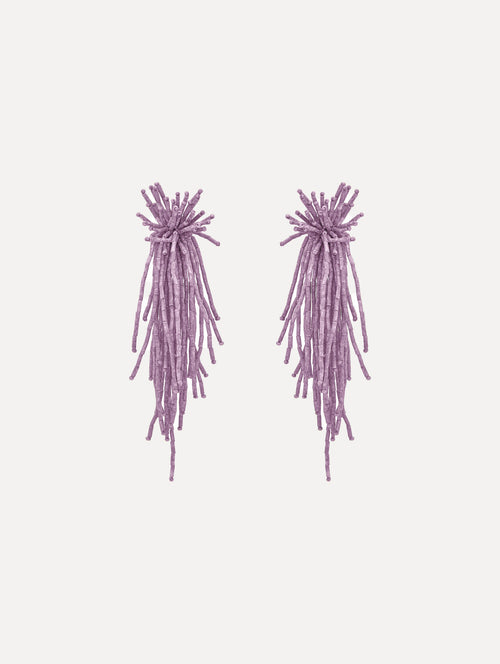The Firework Tassel Earrings in the color pink.