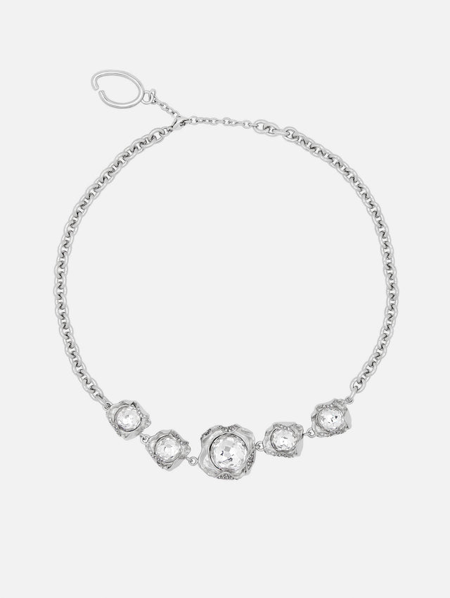Silver chain-link necklace with textured nest and a crystal in the center of each. Front view