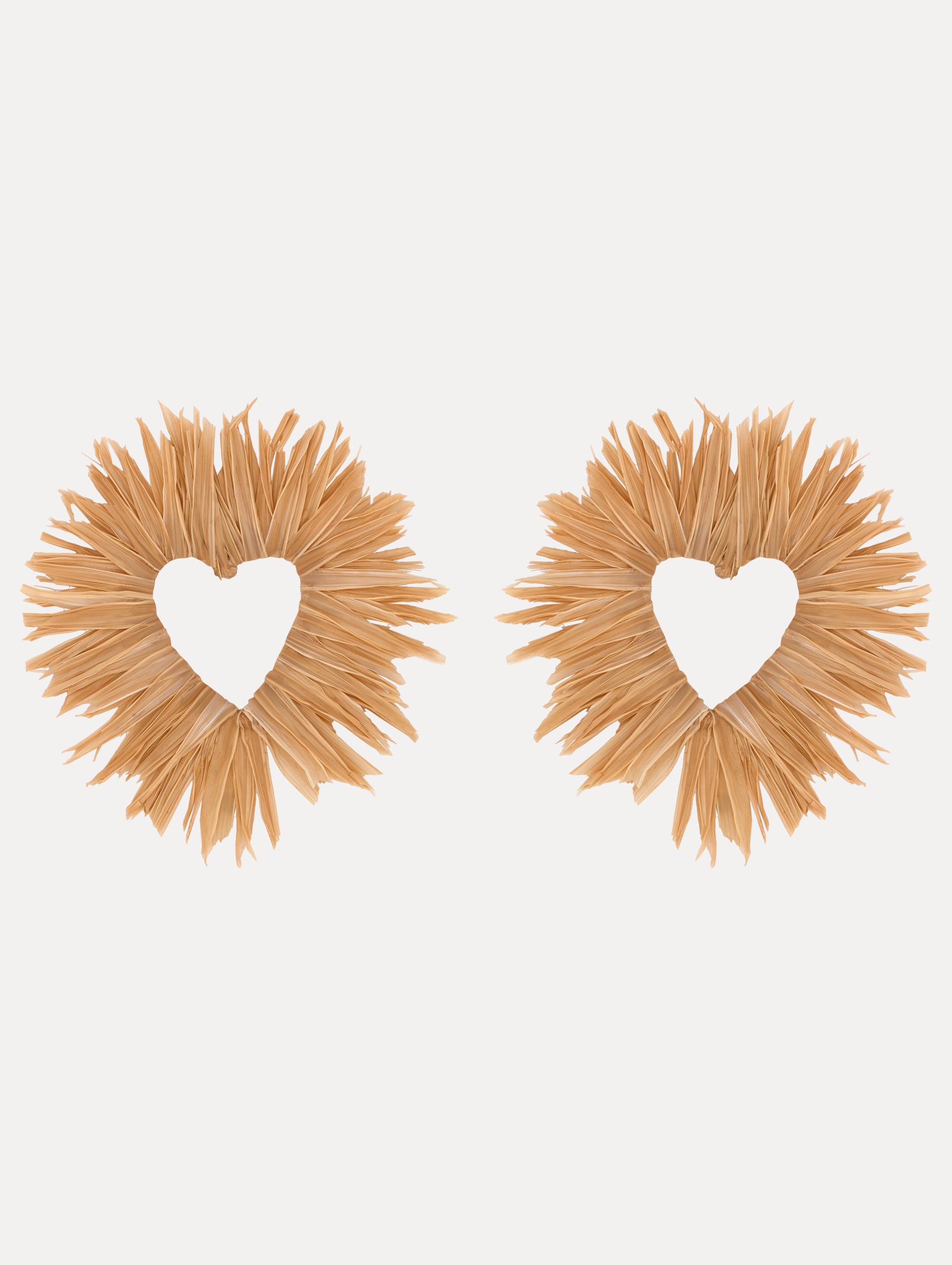 Raffia Heart Cut Out Earrings. Front View.